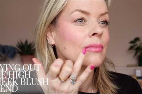 Trying the latest makeup trend for blusher placement